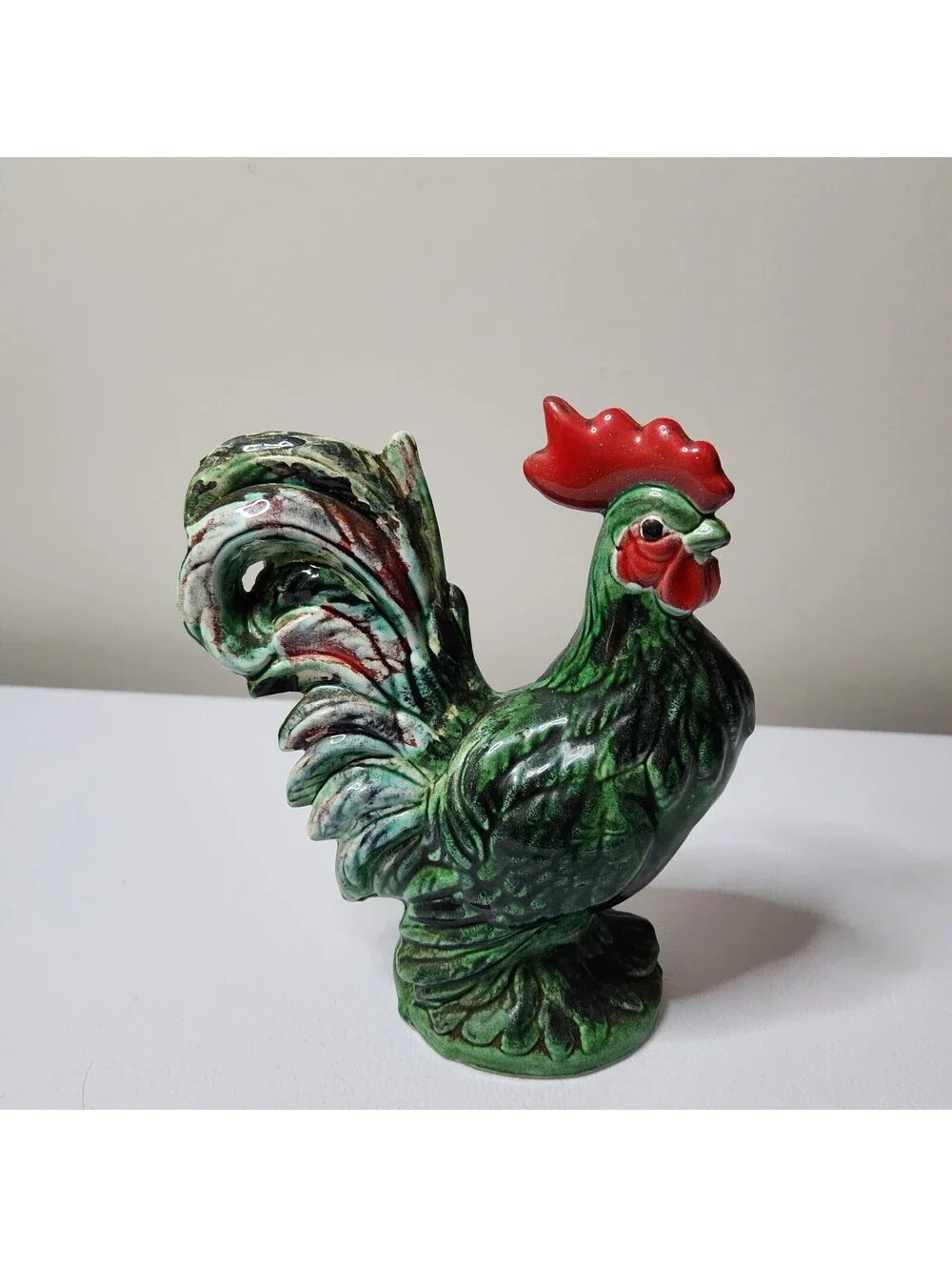 Green ceramic rooster figurine